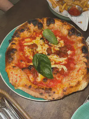 WING members sharing pizza during the outing